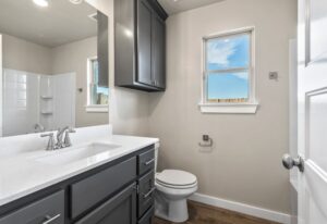 the bathroom with window from Land mark fine homes at Norman, OK