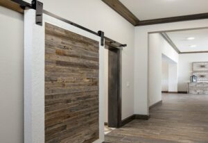 The stylist wooden door from land mark fine homes at Norman, OK