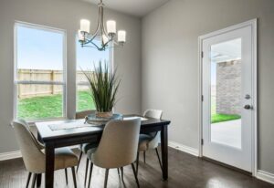 The Dining area with outside look in home from Landmark Fine Homes