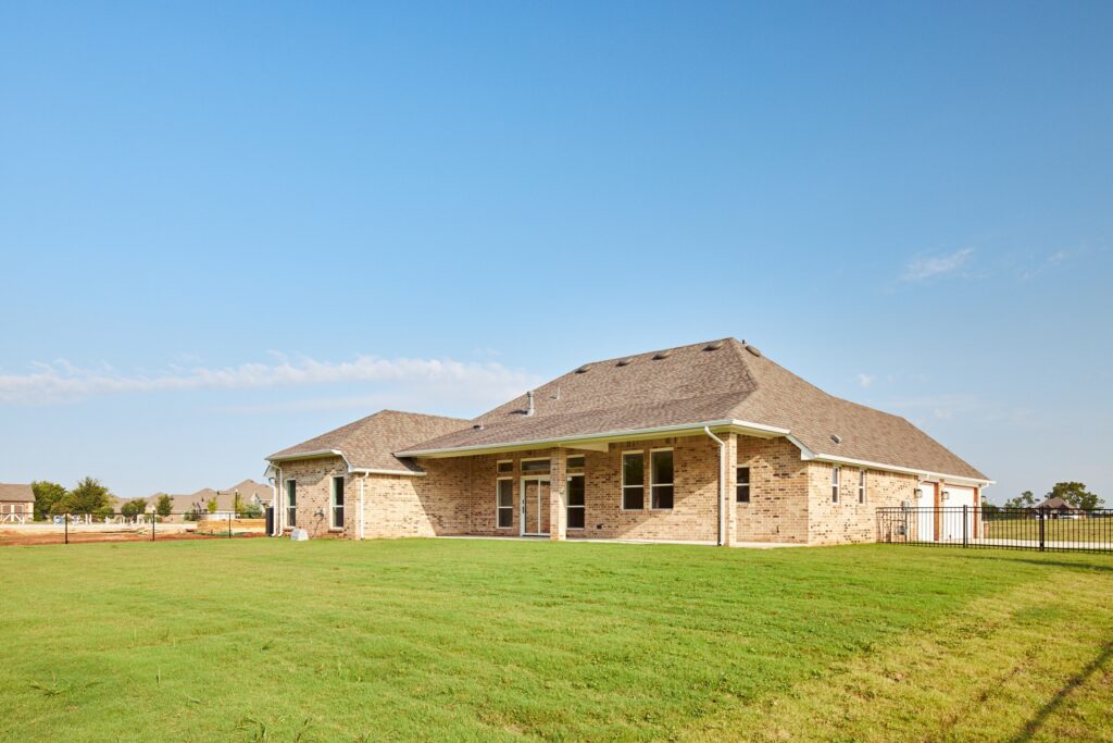 Single-story brick home with Logan floor plan in the Oklahoma City metro area.