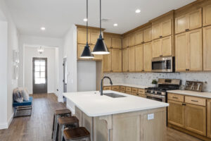 The modeler kitchen with lighting in home at Norman, OK