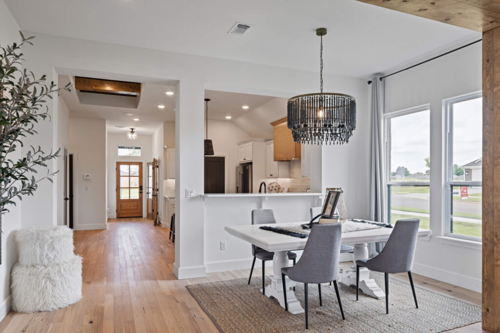 dining area with modern chandelier, open layout and Jack Floor Plan in the Oklahoma City metro area