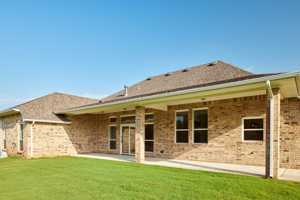 Single-story brick home with a Logan floor plan in the Oklahoma City metro area