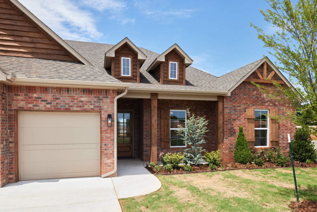 Beautiful residence with Preston floor plan and landscaped lawn in the Oklahoma City metro area