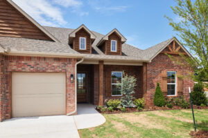 Beautiful residence with Preston floor plan and landscaped lawn in the Oklahoma City metro area