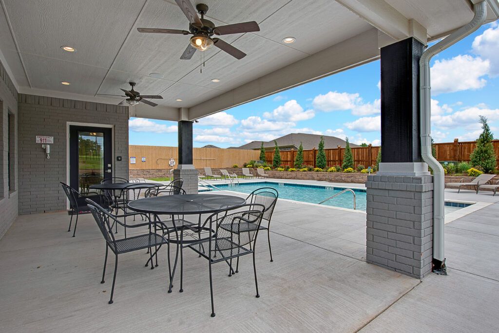 Cozy Outdoor Area with Comfortable Seating and a Pool in The Oklahoma City Metropolitan Area 