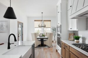 The dining area of a ledger house built by Landmark Fine Homes in Oklahoma City