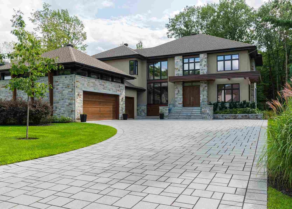 A large house with a driveway in Oklahoma city metro