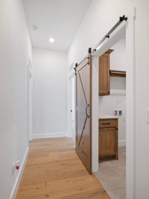 Lobby area near a laundry room built by Landmark Fine Homes in Oklahoma City