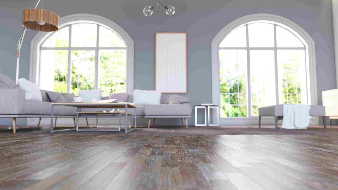 Choosing the right flooring for your new home with gray walls and wood floors in Oklahoma City