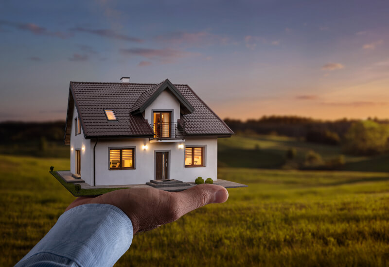 Man showcasing his model home to be built more cheaply on his land in the Oklahoma City metro area